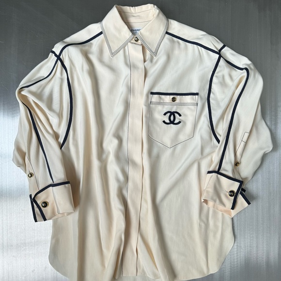 CHANEL Tops - Chanel Vintage Embroidered Logo Button Down in Cream and Navy